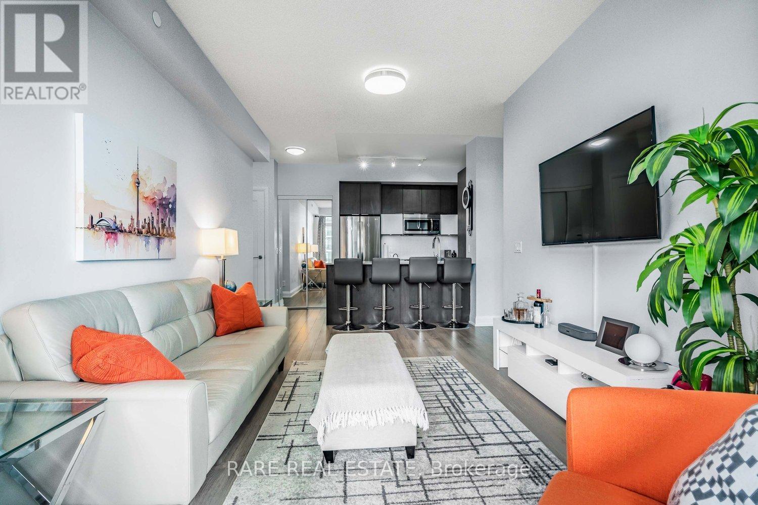 2404 - 56 Annie Craig Drive, Toronto, ON - Indoor Photo Showing Living Room