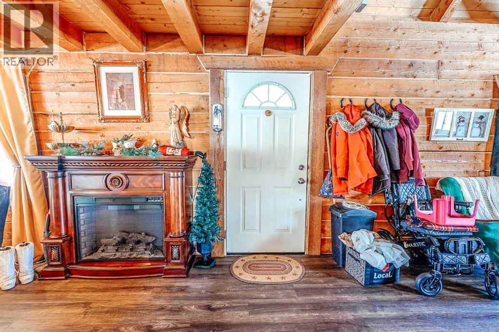 11401 800 Township, Rural Saddle Hills County, AB - Indoor Photo Showing Other Room With Fireplace