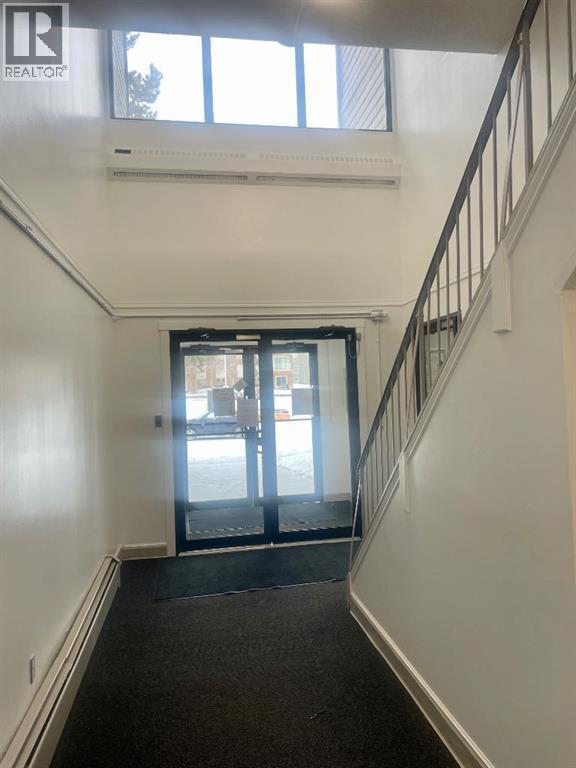 205A, 5611 10 Avenue, Edson, AB - Indoor Photo Showing Other Room