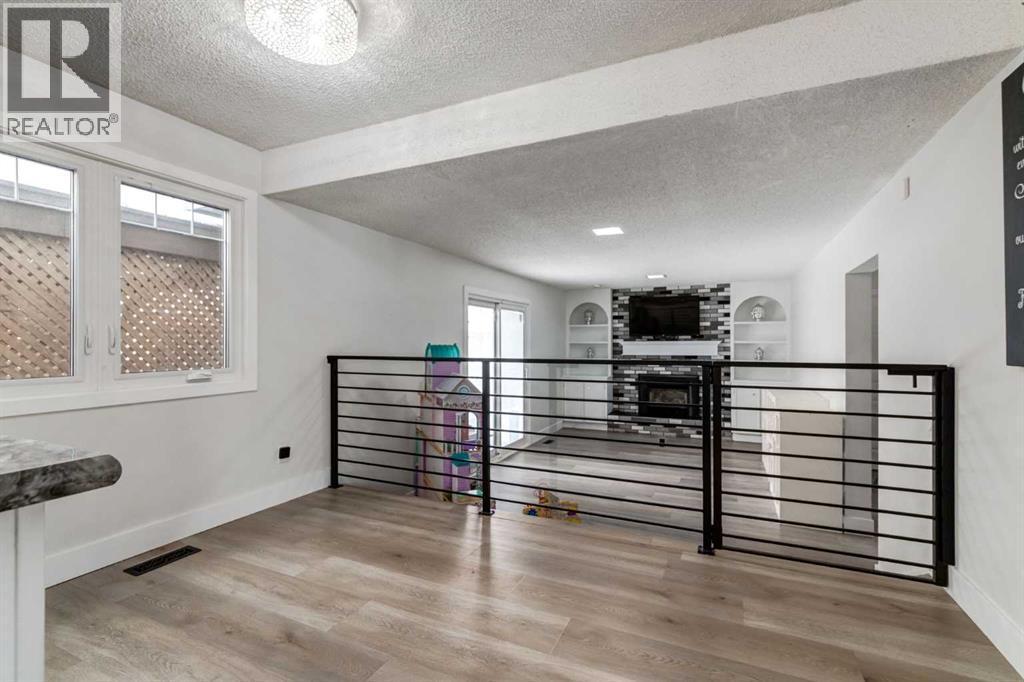 16 Woodgate Close Sw, Calgary, AB - Indoor Photo Showing Other Room