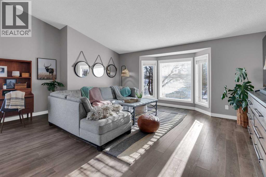 LIVING ROOM - 40 Hunters Gate, Okotoks, AB - Indoor Photo Showing Living Room