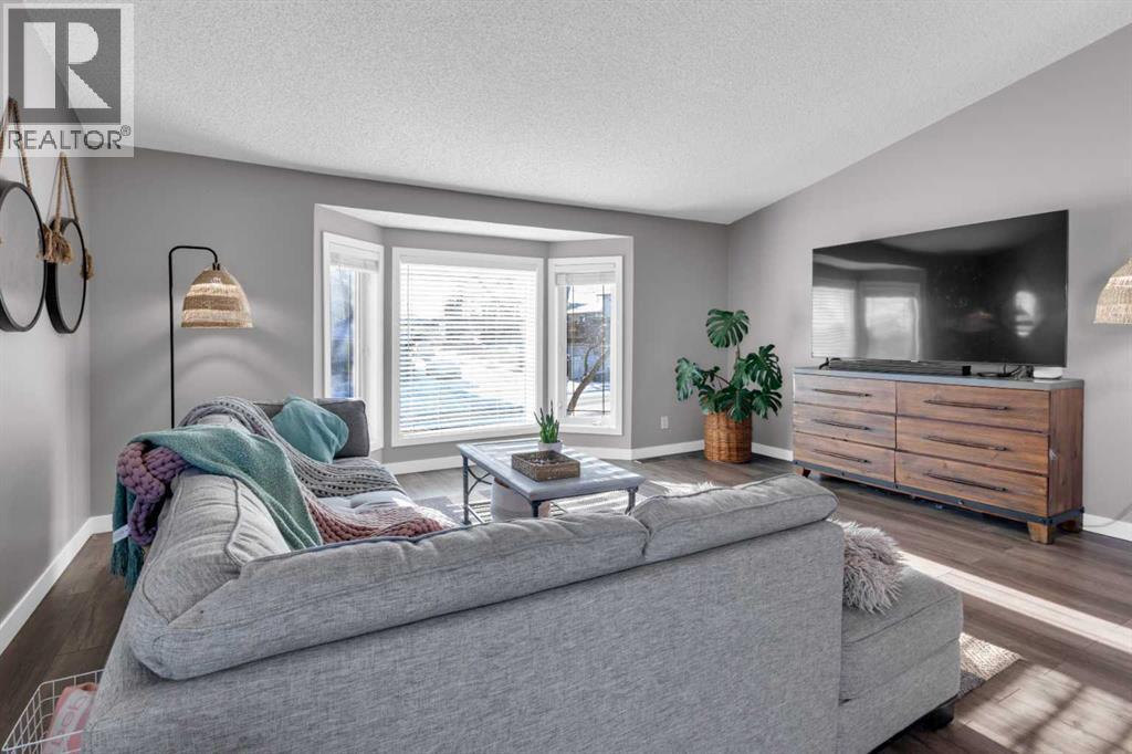 LIVING ROOM - 40 Hunters Gate, Okotoks, AB - Indoor Photo Showing Living Room