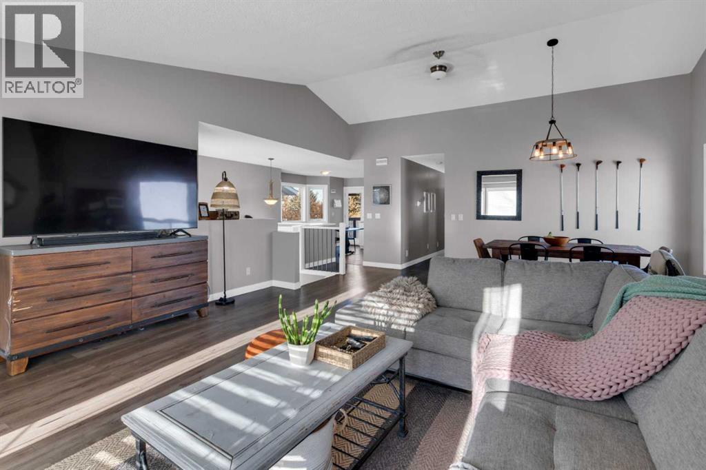 VAULTED CEILINGS - 40 Hunters Gate, Okotoks, AB - Indoor Photo Showing Living Room