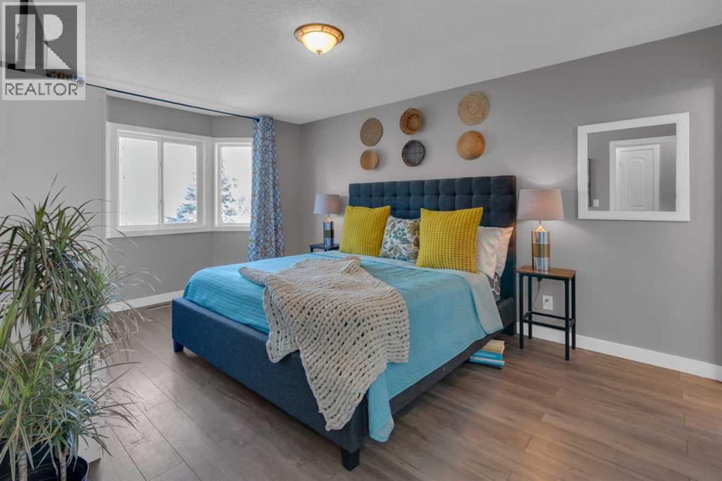 PRIMARY BEDROOM - 40 Hunters Gate, Okotoks, AB - Indoor Photo Showing Bedroom