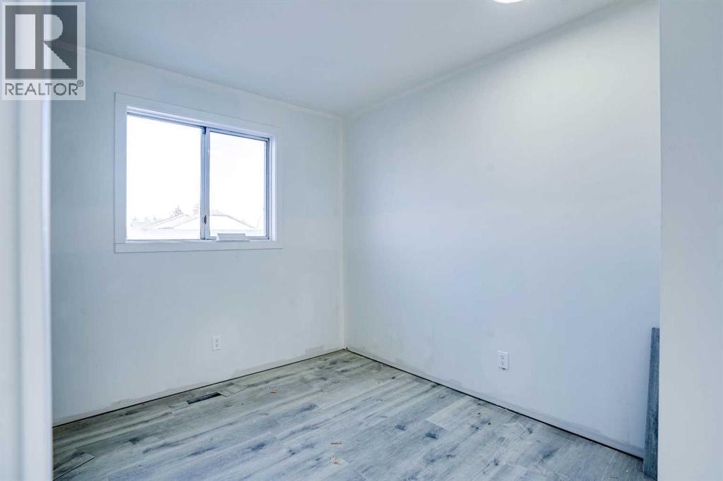 94 Martindale Boulevard Ne, Calgary, AB - Indoor Photo Showing Other Room
