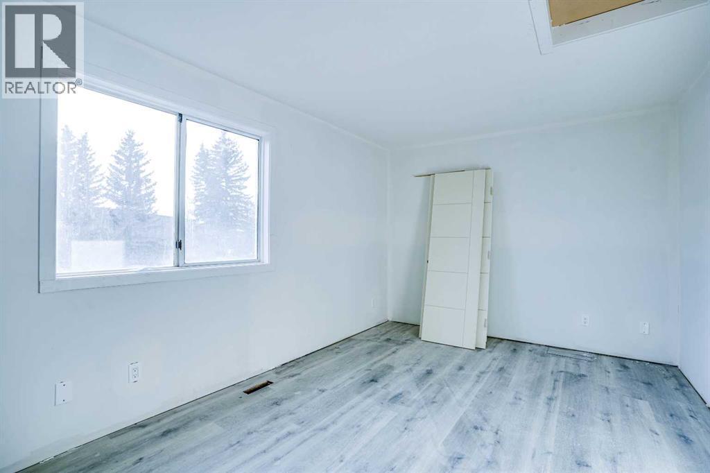 94 Martindale Boulevard Ne, Calgary, AB - Indoor Photo Showing Other Room