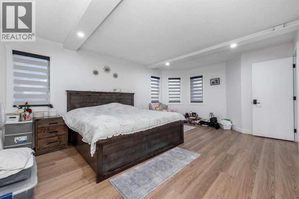 133 Woodbrook Road Sw, Calgary, AB - Indoor Photo Showing Bedroom