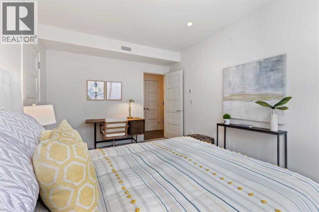 2nd Bedroom - 102, 101A Stewart Creek Rise, Canmore, AB - Indoor Photo Showing Bedroom