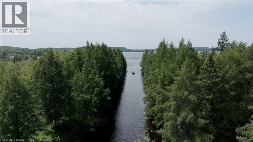 85 Hutchinson Beach Road Unit# B56, Huntsville, ON - Outdoor With Body Of Water With View