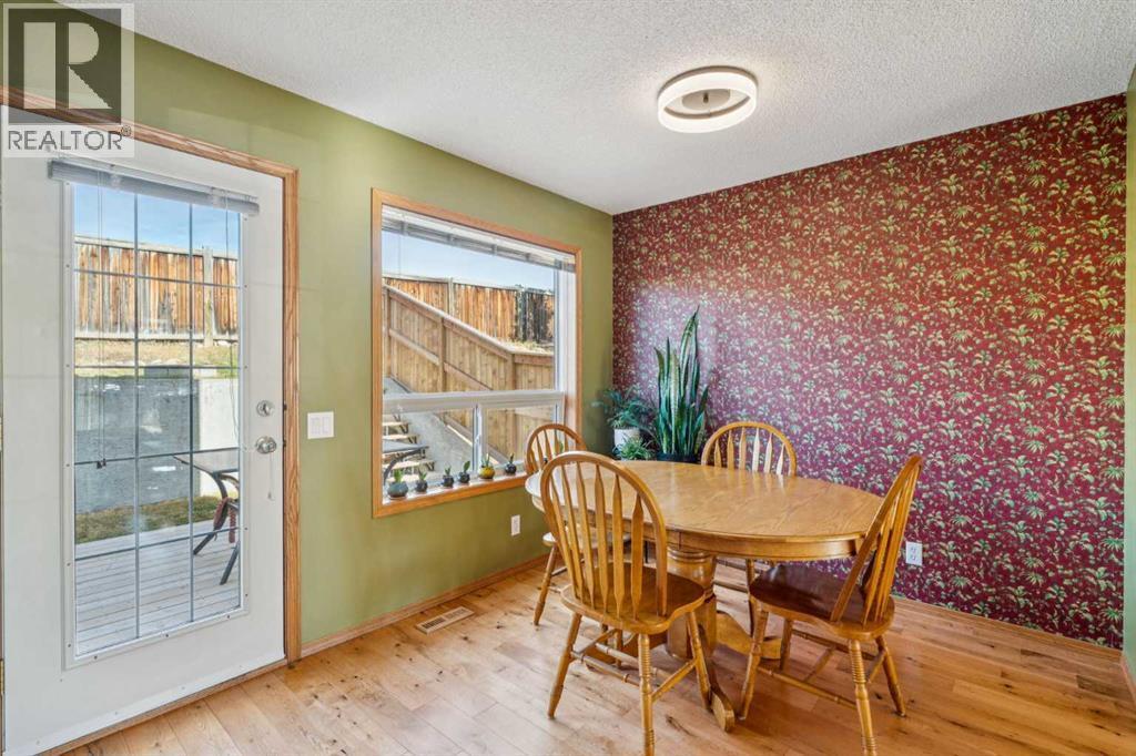 56 West Terrace Road, Cochrane, AB - Indoor Photo Showing Dining Room