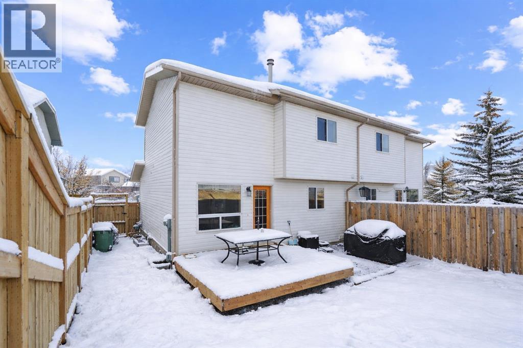 56 West Terrace Road, Cochrane, AB - Outdoor With Deck Patio Veranda With Exterior