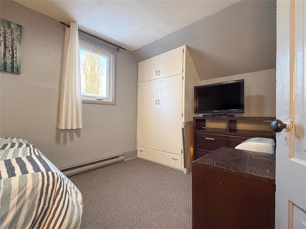 310 Commercial Street, Wawanesa, MB - Indoor Photo Showing Bedroom