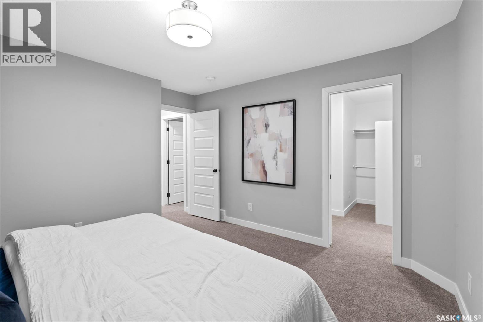 102 Kostiuk Crescent, Saskatoon, SK - Indoor Photo Showing Bedroom