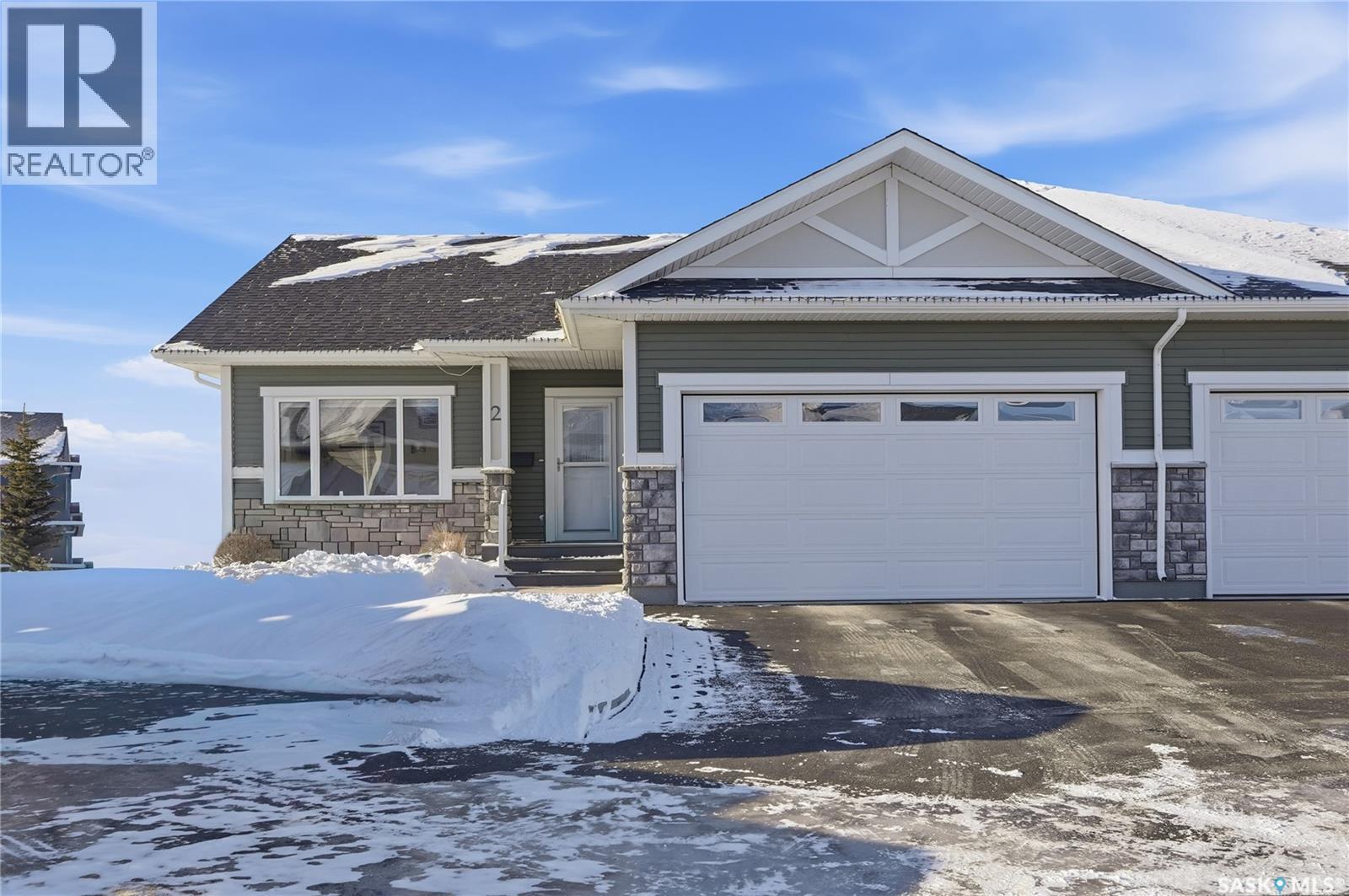 2 433 Palmer Crescent, Warman, SK - Outdoor With Facade