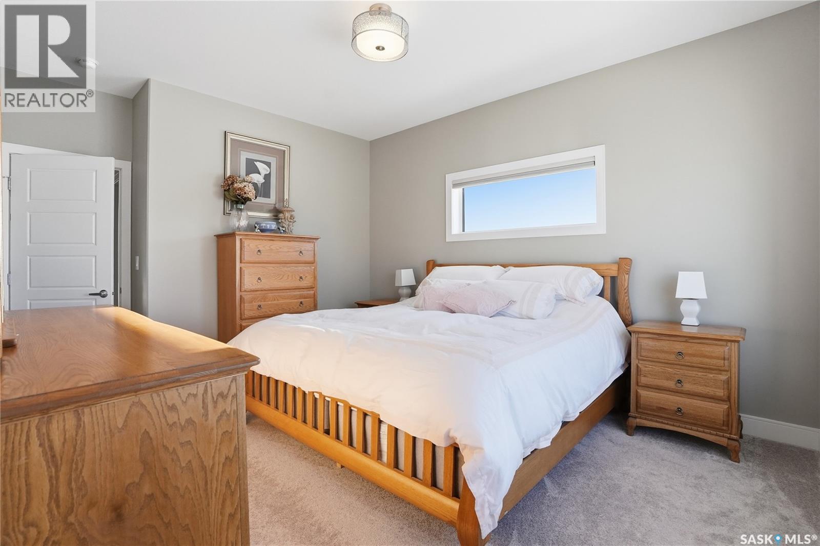 2 433 Palmer Crescent, Warman, SK - Indoor Photo Showing Bedroom