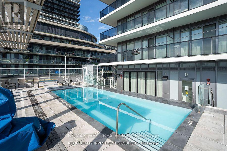 404 - 70 Annie Craig Drive, Toronto, ON - Outdoor With In Ground Pool