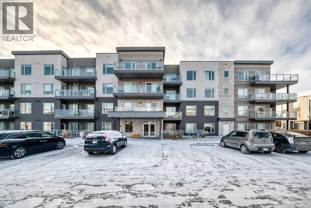 316, 200 Shawnee Square Sw, Calgary, AB - Outdoor With Balcony With Facade