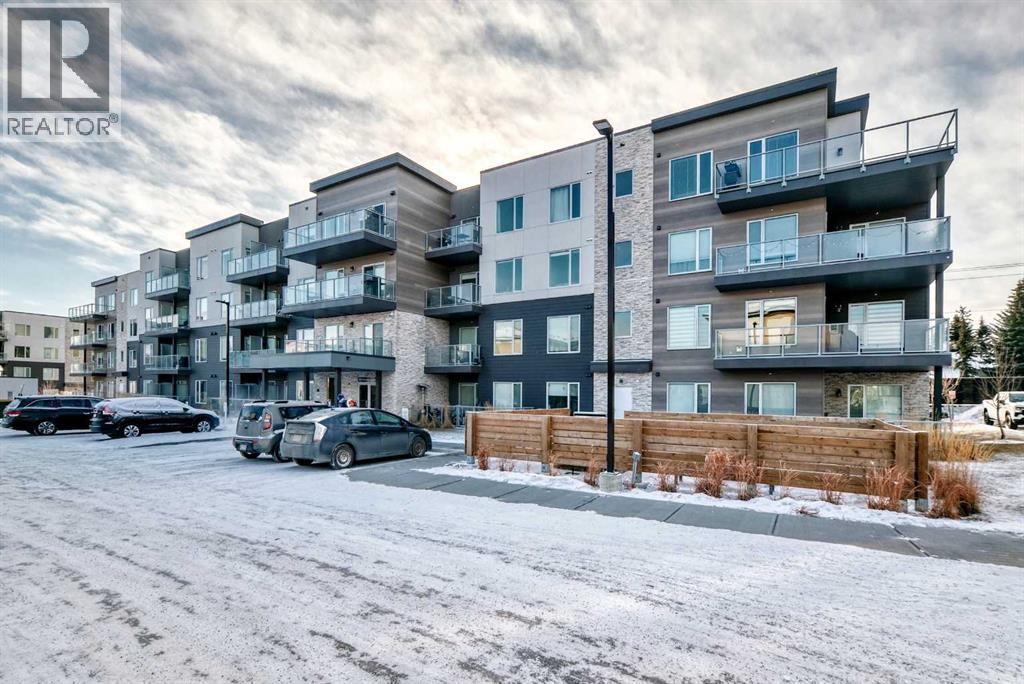 316, 200 Shawnee Square Sw, Calgary, AB - Outdoor With Balcony With Facade