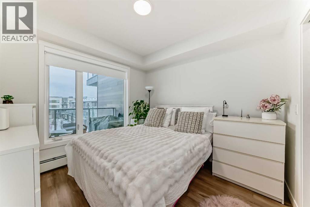 316, 200 Shawnee Square Sw, Calgary, AB - Indoor Photo Showing Bedroom