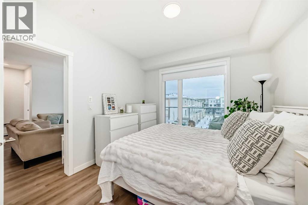 316, 200 Shawnee Square Sw, Calgary, AB - Indoor Photo Showing Bedroom