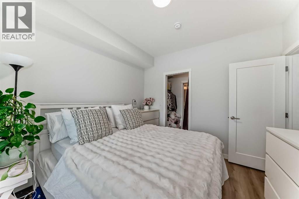 316, 200 Shawnee Square Sw, Calgary, AB - Indoor Photo Showing Bedroom