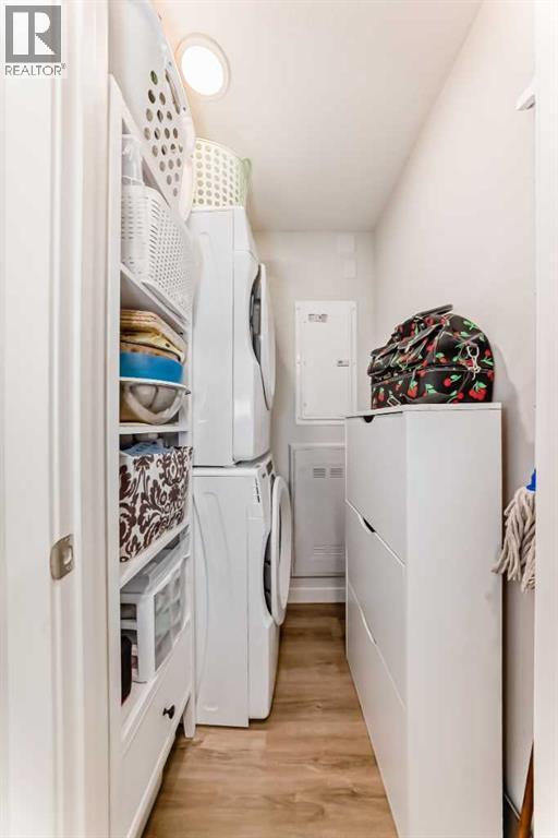 316, 200 Shawnee Square Sw, Calgary, AB - Indoor Photo Showing Laundry Room