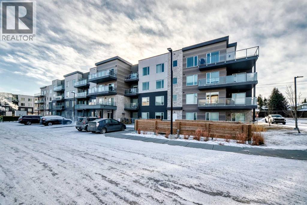316, 200 Shawnee Square Sw, Calgary, AB - Outdoor With Balcony With Facade