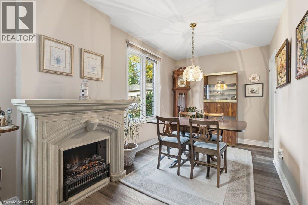 5119 Cherryhill Crescent, Burlington, ON - Indoor Photo Showing Dining Room With Fireplace