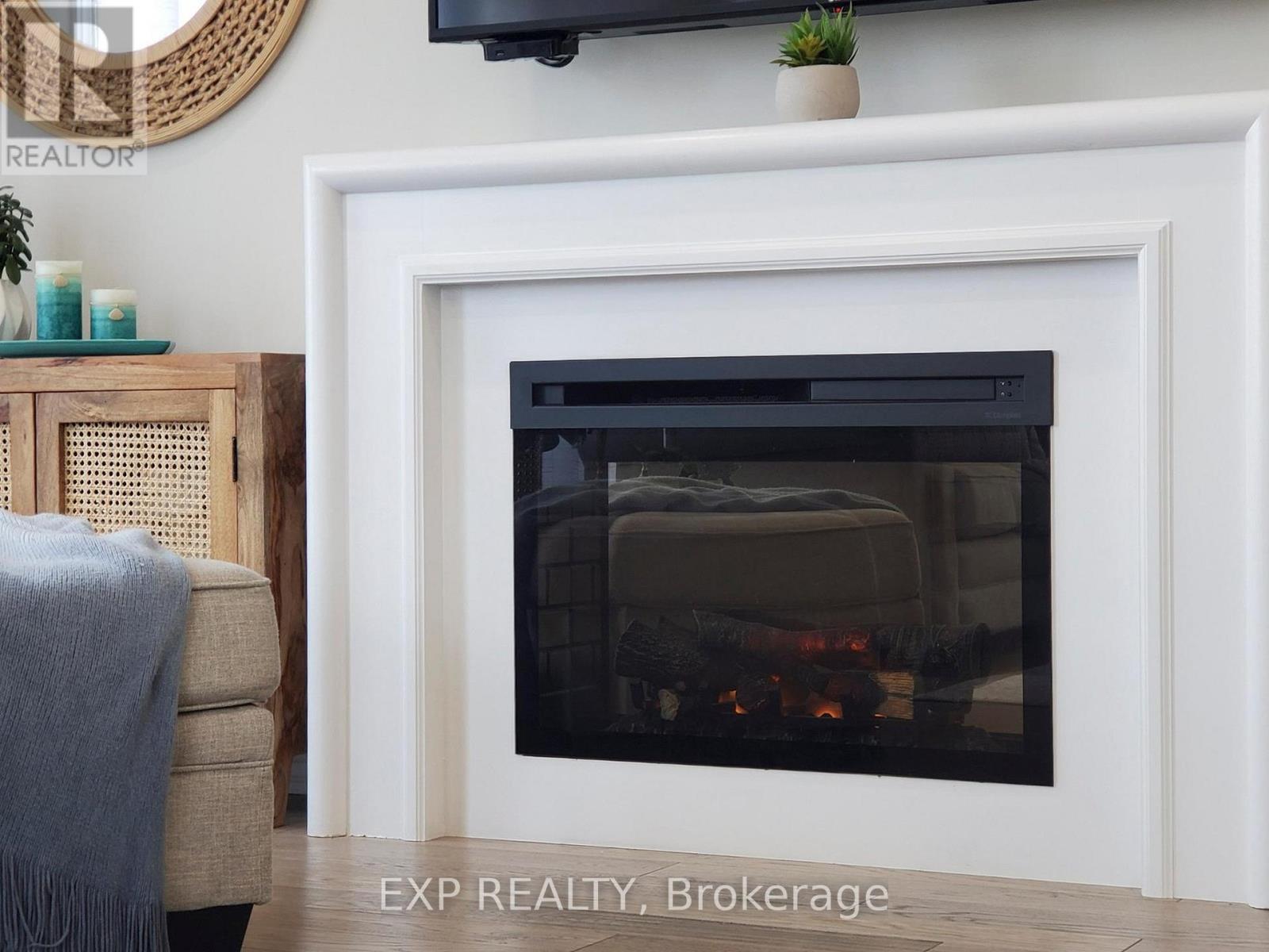 58 Elkington Crescent, Whitby, ON - Indoor With Fireplace