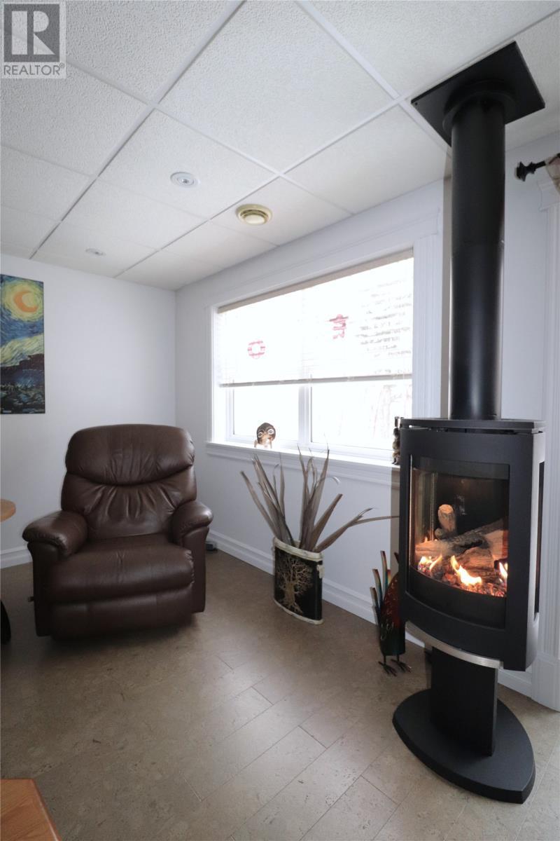 21 Lakeshore Drive, Pasadena, NL - Indoor With Fireplace