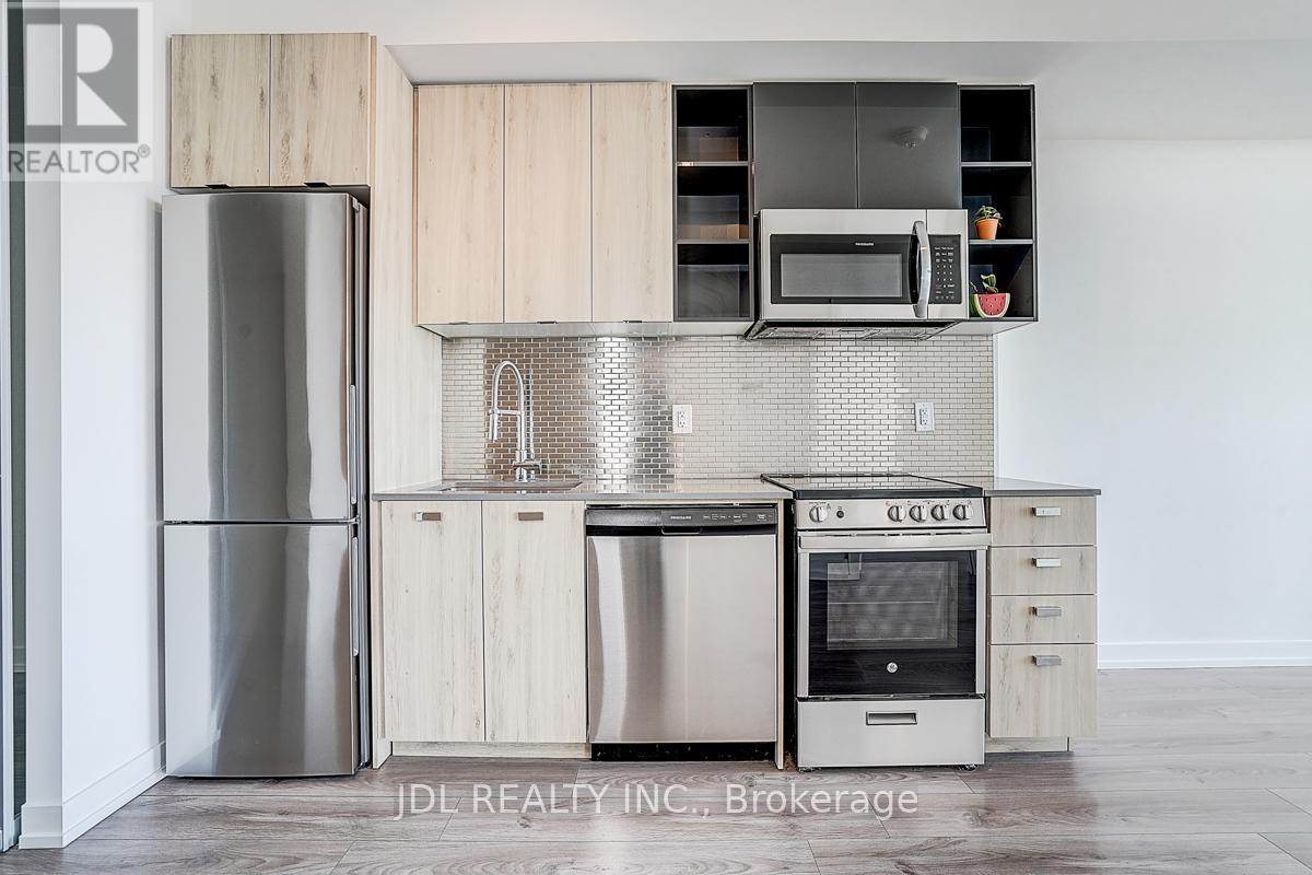 808 - 10 De Boers Drive, Toronto, ON - Indoor Photo Showing Kitchen With Stainless Steel Kitchen With Upgraded Kitchen