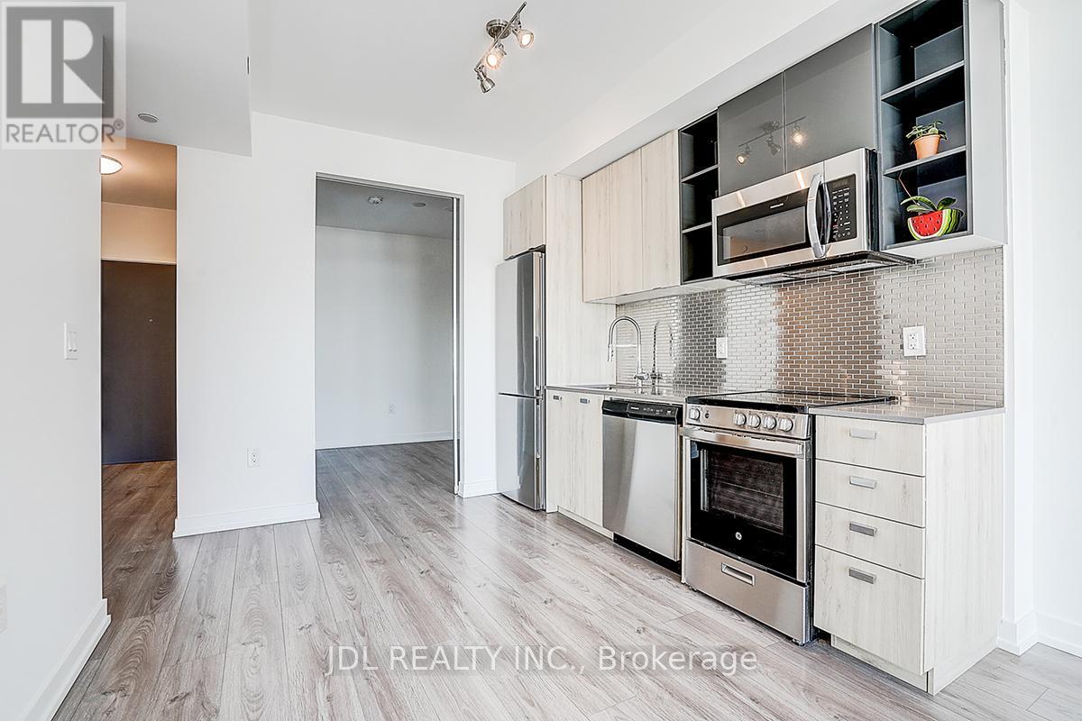 808 - 10 De Boers Drive, Toronto, ON - Indoor Photo Showing Kitchen With Stainless Steel Kitchen With Upgraded Kitchen