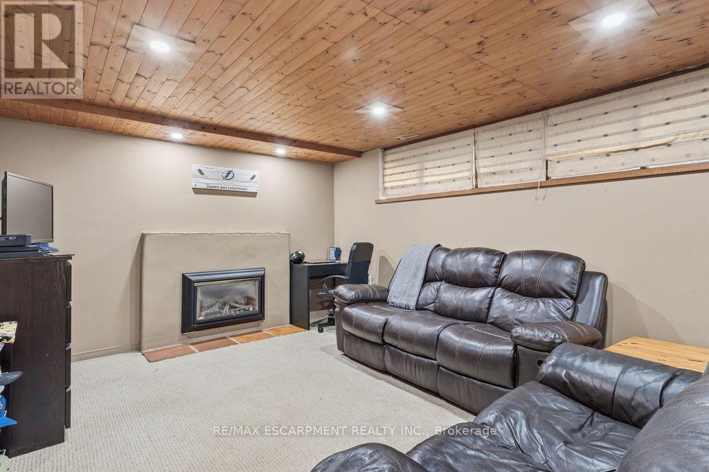 5119 Cherryhill Crescent, Burlington, ON - Indoor Photo Showing Basement With Fireplace