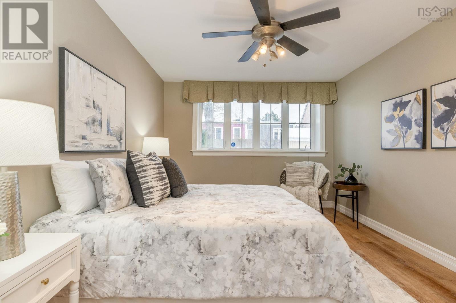 Brand new laminate flooring on lower level - 5411 Saunders Lane, Halifax, NS - Indoor Photo Showing Bedroom