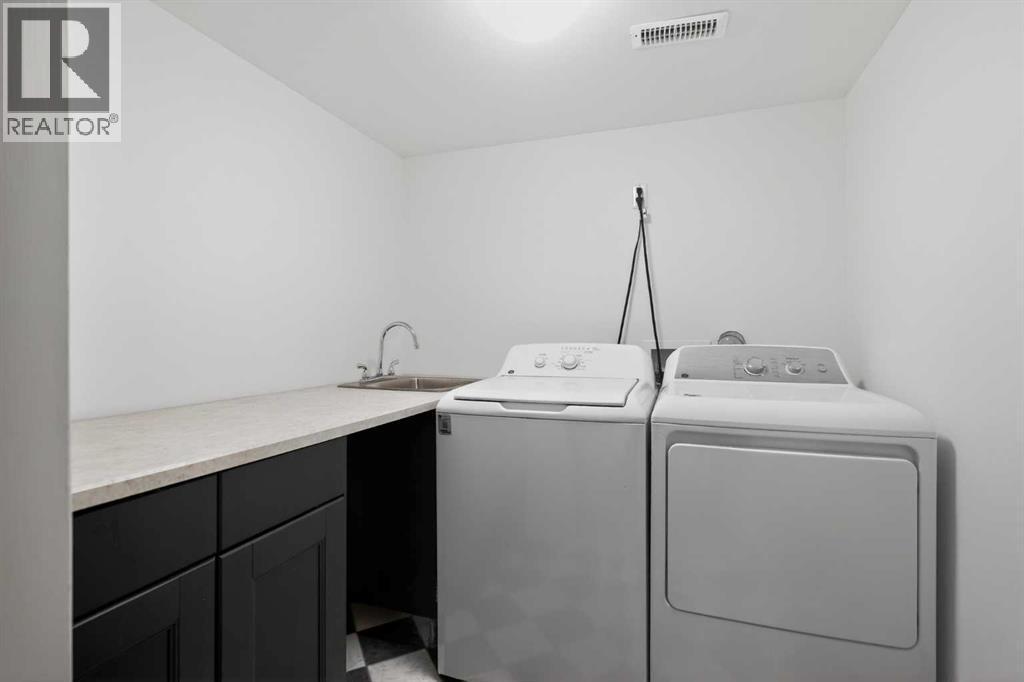 4112 19 Street Nw, Calgary, AB - Indoor Photo Showing Laundry Room