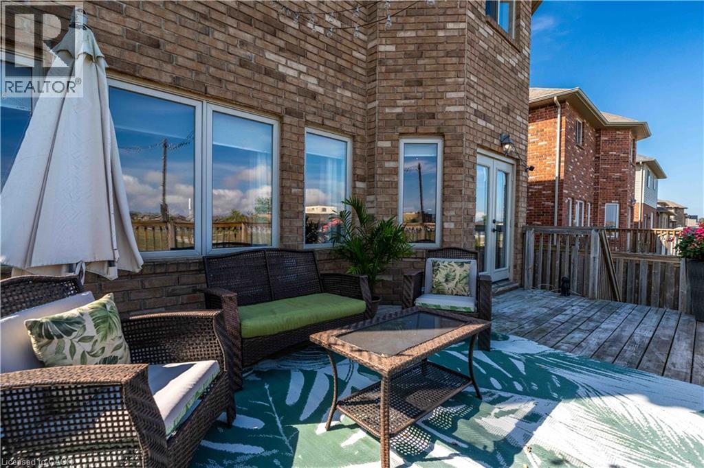 Alternate view of rear deck overlooking greenspace and school beyond - 51 Showcase Drive, Hamilton, ON - Outdoor With Deck Patio Veranda
