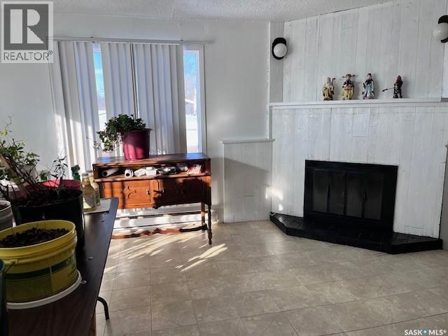 207 Kinistino Avenue W, Kinistino, SK - Indoor With Fireplace