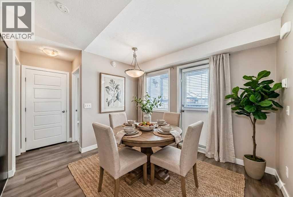 Staged Dining Nook - 11302, 2781 Chinook Winds Drive Sw, Airdrie, AB - Indoor Photo Showing Dining Room
