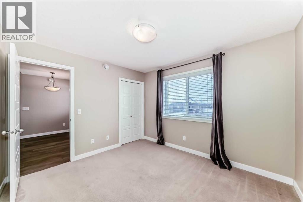 Current Second Bedroom - 11302, 2781 Chinook Winds Drive Sw, Airdrie, AB - Indoor