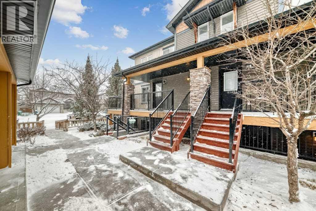 Walkway provides easy access to additional street parking if needed - 11302, 2781 Chinook Winds Drive Sw, Airdrie, AB - Outdoor