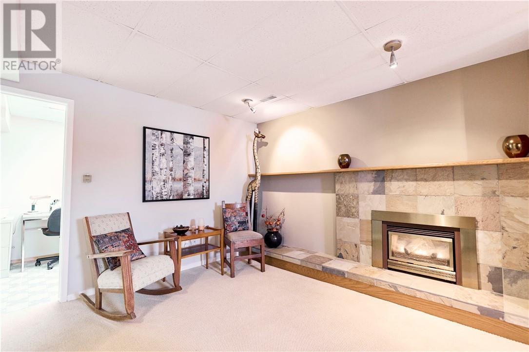 1225 Drummond, Sudbury, ON - Indoor Photo Showing Living Room With Fireplace