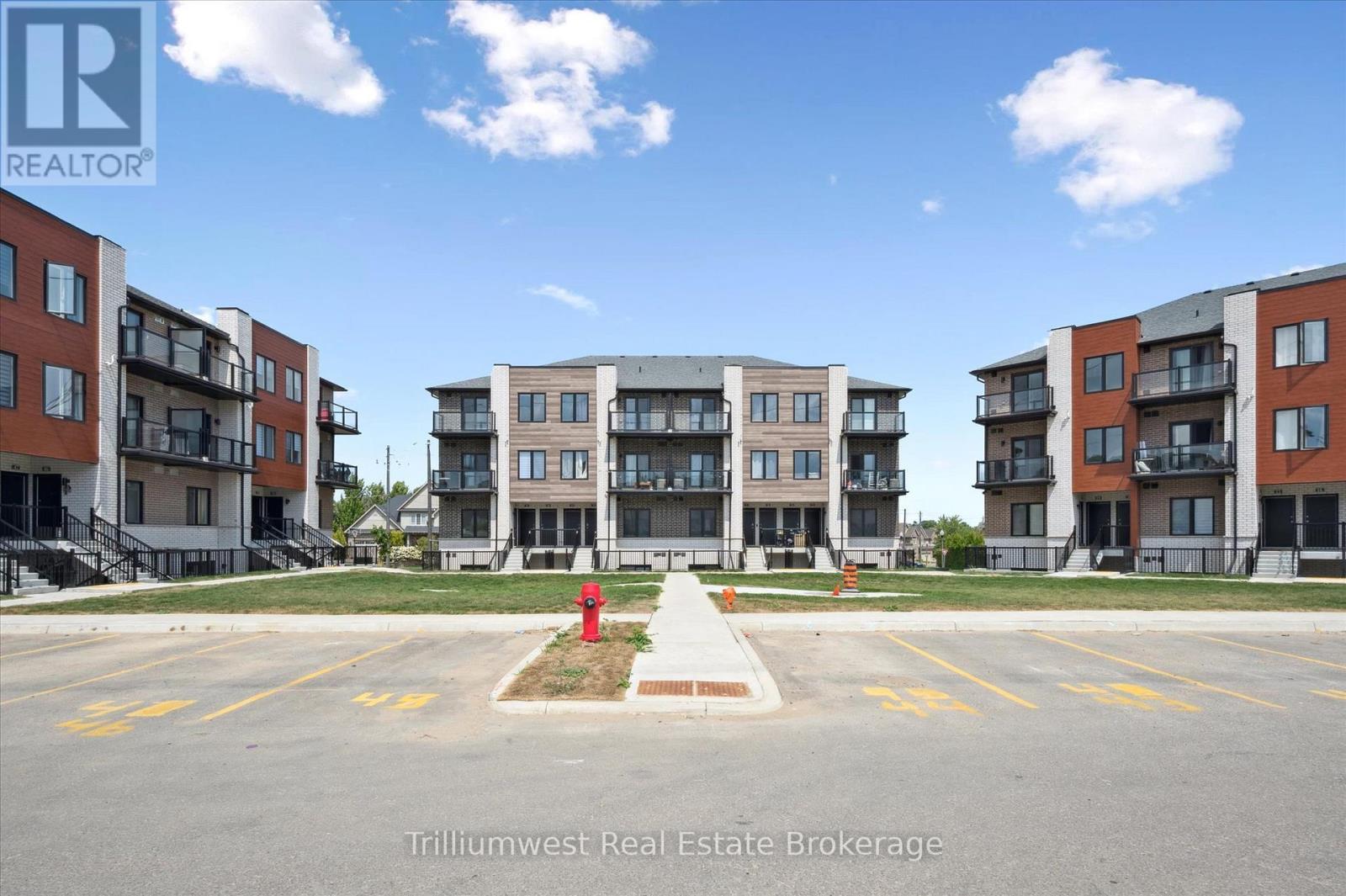 34 - 10 South Creek Drive, Kitchener, ON - Outdoor With Balcony With Facade