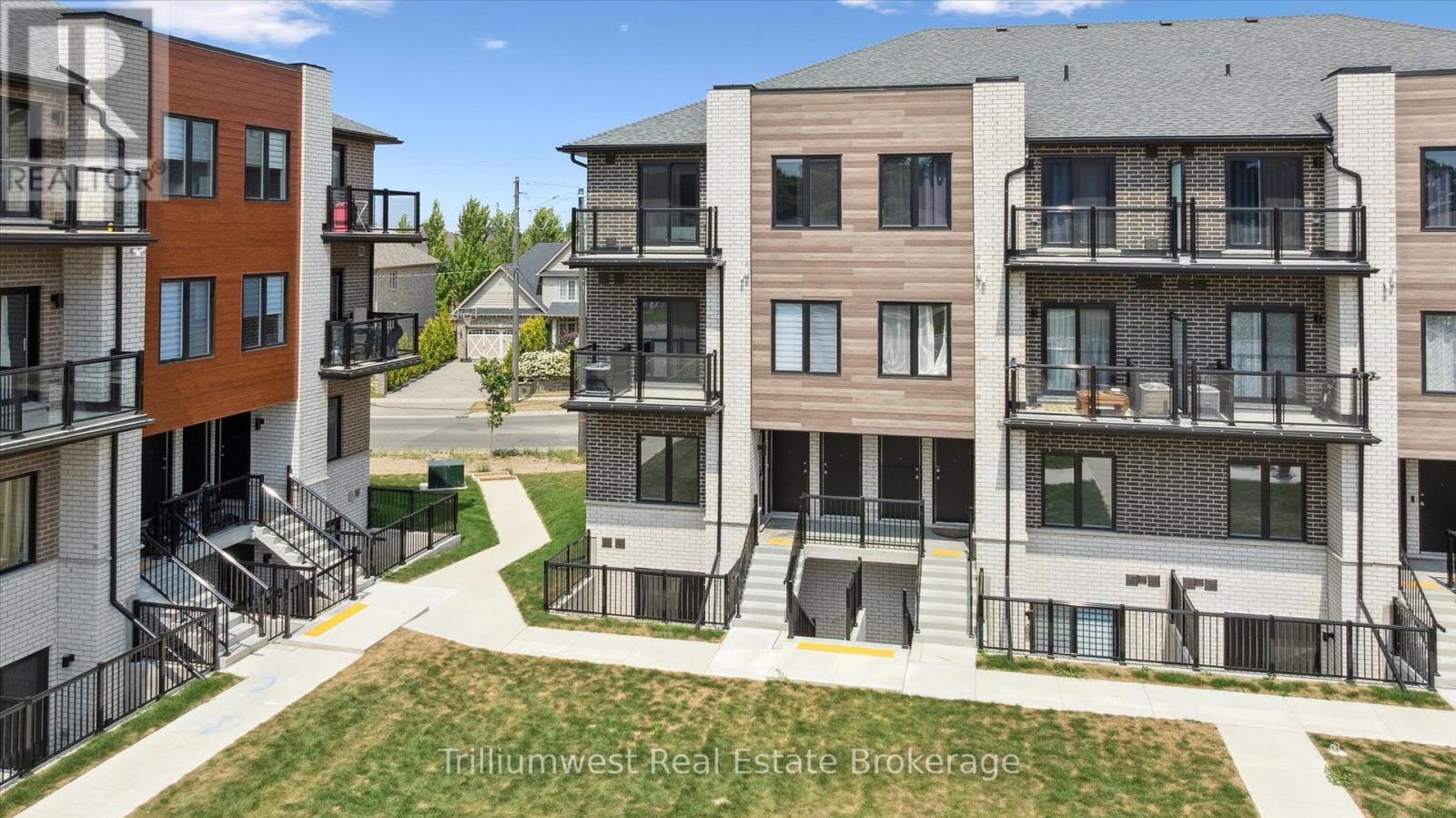 34 - 10 South Creek Drive, Kitchener, ON - Outdoor With Balcony With Facade