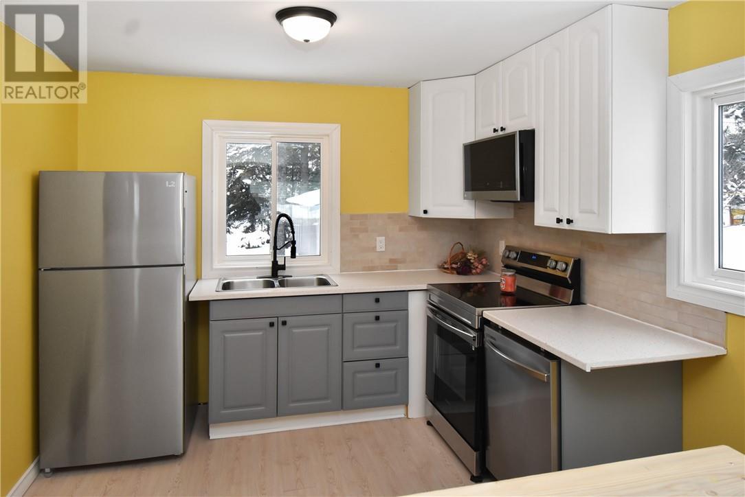12 Riverview Avenue, Levack, ON - Indoor Photo Showing Kitchen With Double Sink