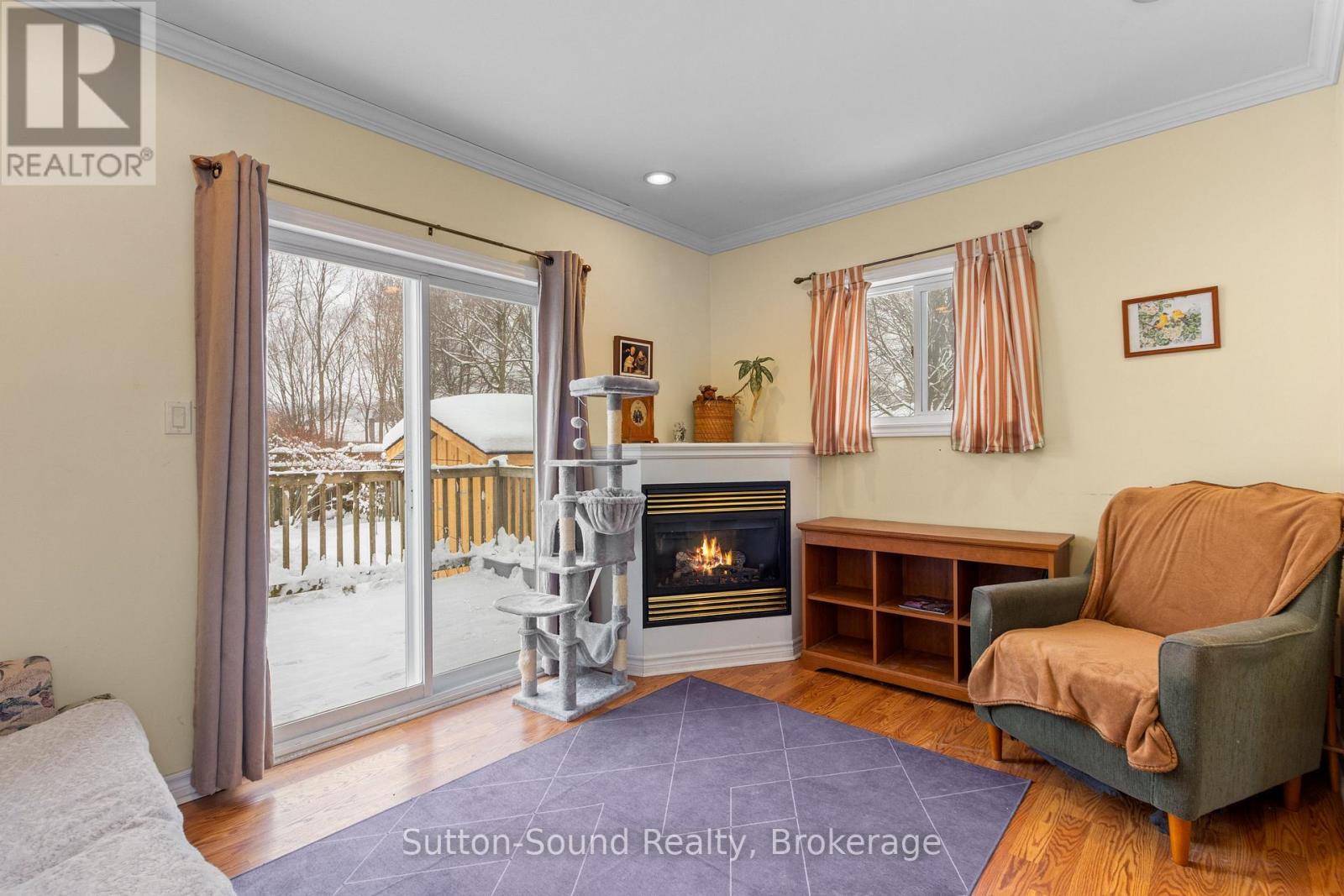 Addition off rear with sitting area and fireplace - 269 6Th Street E, Owen Sound, ON - Indoor With Fireplace