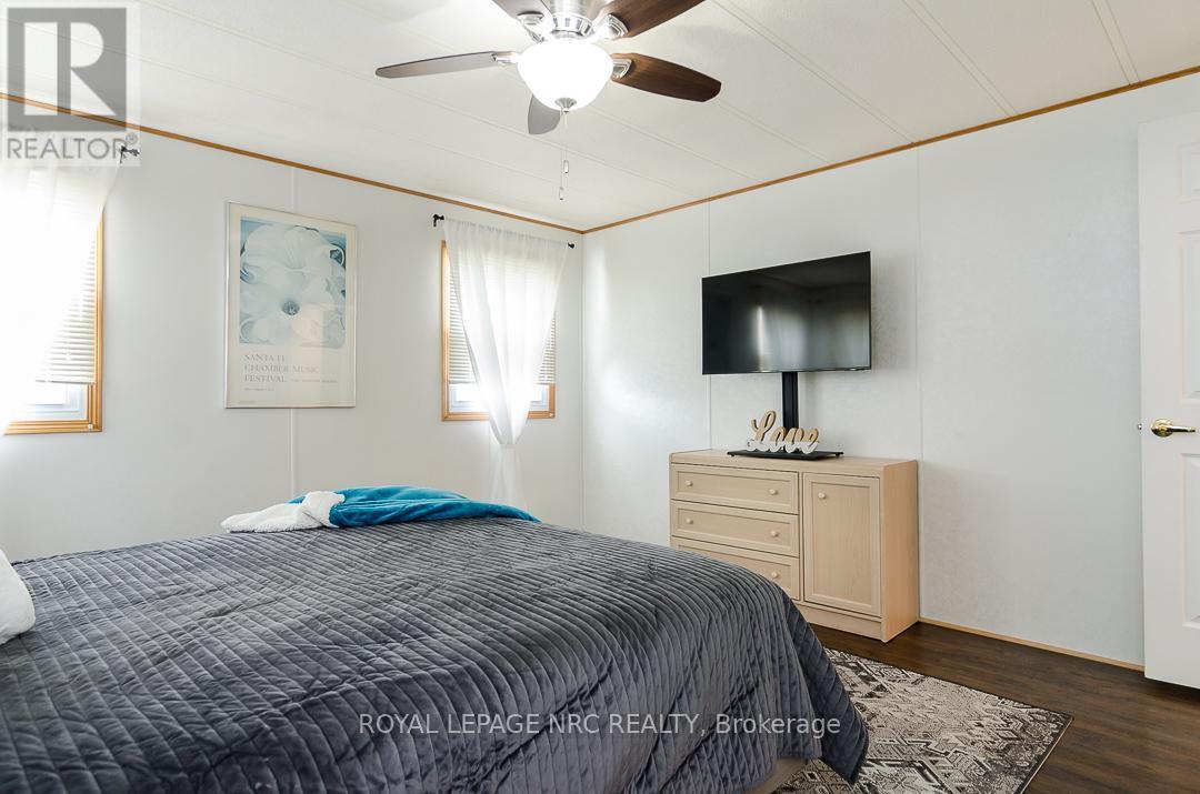 Primary Bedroom - 254 - 3033 Townline Road, Fort Erie (Black Creek), ON - Indoor Photo Showing Bedroom