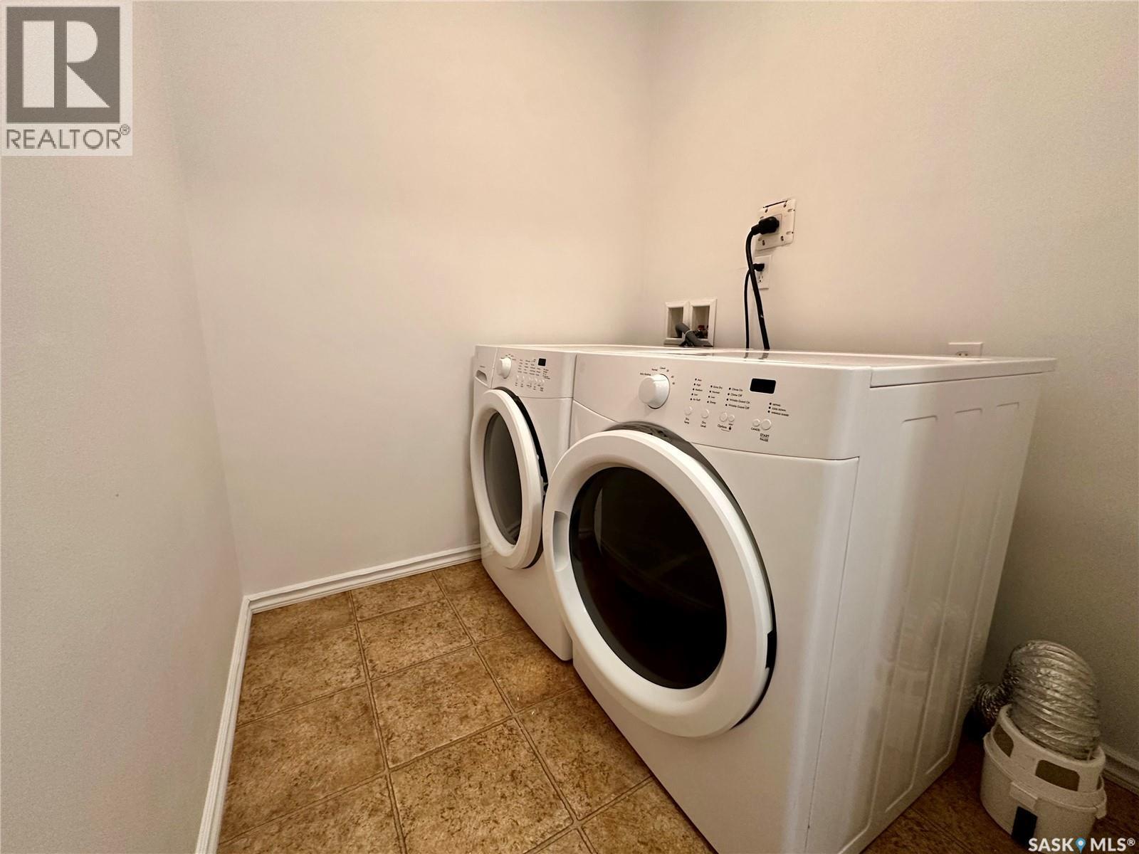 307 2233 St Henry Avenue, Saskatoon, SK - Indoor Photo Showing Laundry Room