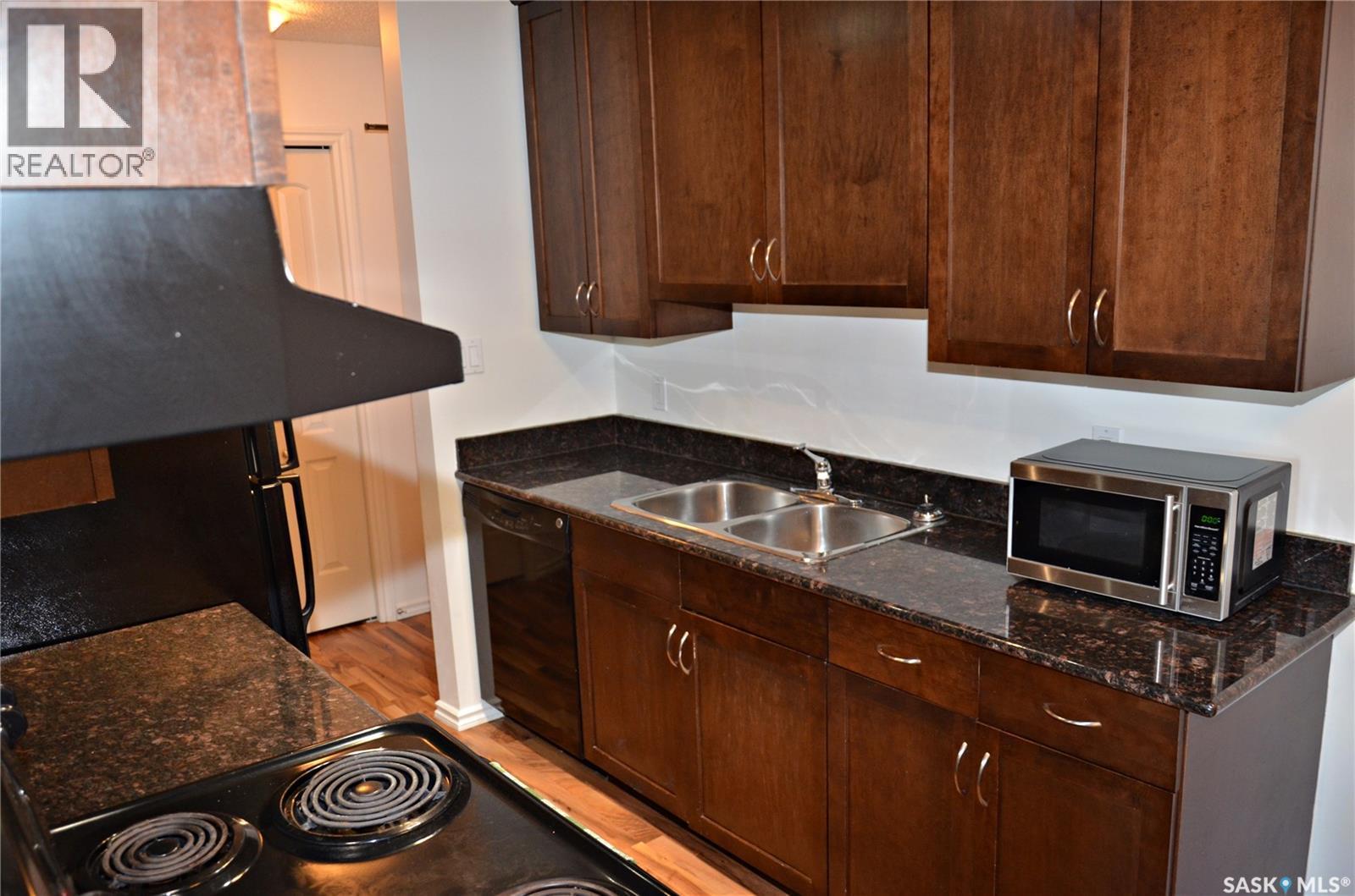 307 2233 St Henry Avenue, Saskatoon, SK - Indoor Photo Showing Kitchen With Double Sink