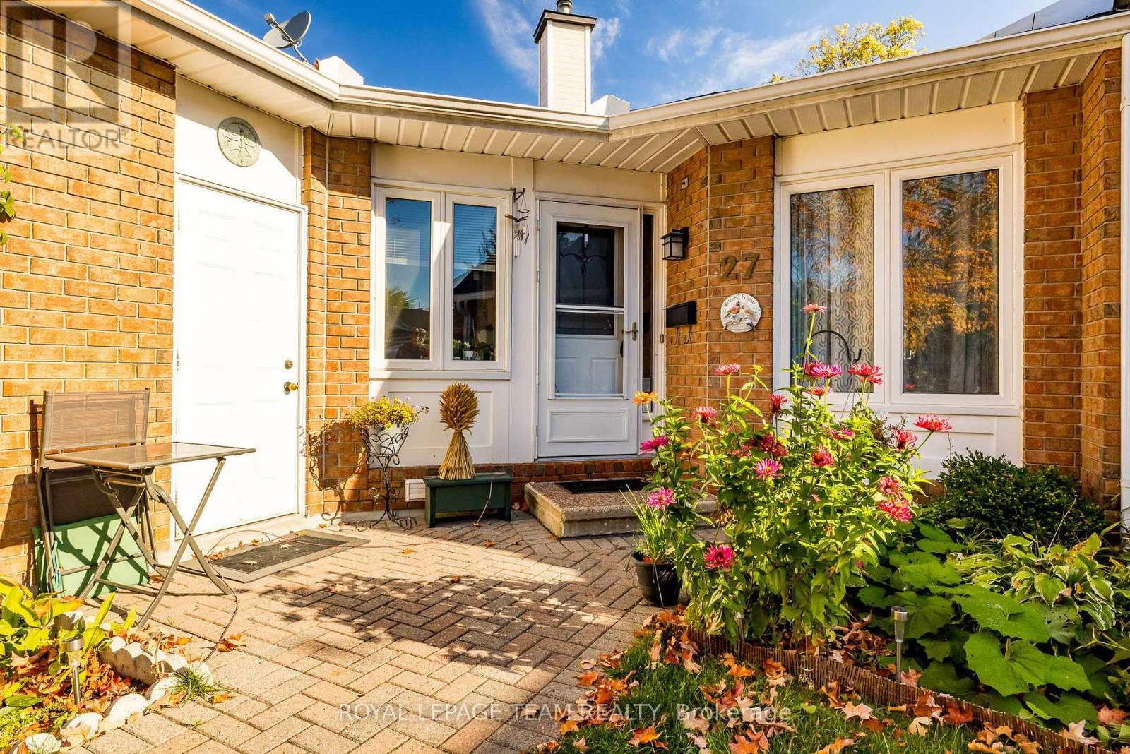 landscaping at front - 14 - 27 Pine Needles Court, Ottawa, ON - Outdoor With Deck Patio Veranda