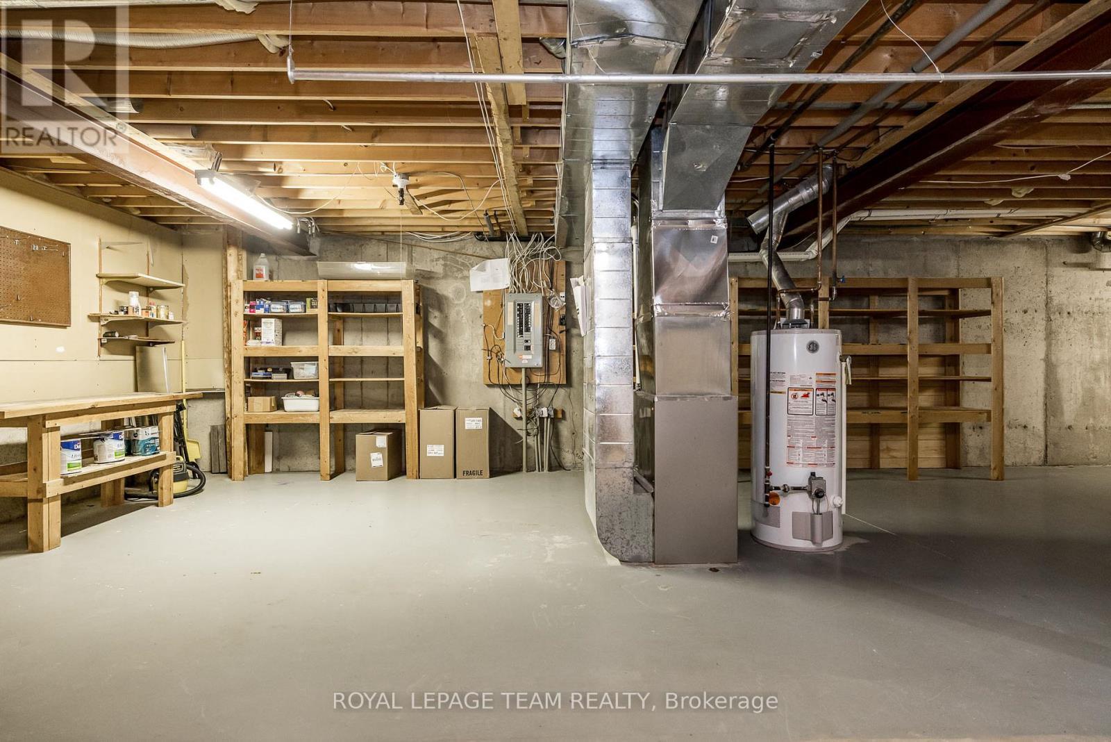 storage and shelving - 14 - 27 Pine Needles Court, Ottawa, ON - Indoor Photo Showing Basement